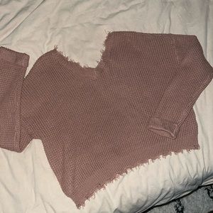 Distressed cropped sweater